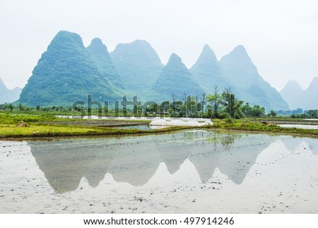 Karst mountains and rural scenery in spring
