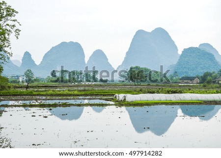 Karst mountains and rural scenery in spring
