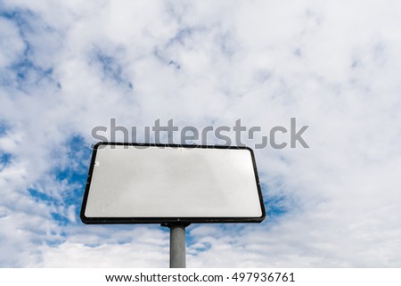 blank road sign on background sky