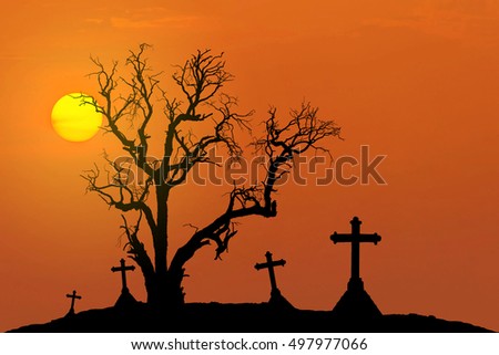 scary silhouette dead tree and spooky silhouette crosses in mystic graveyard and full moon in Halloween concept background
