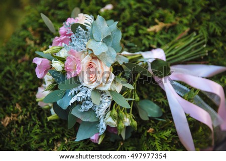 Wedding bouquet on background of green grass