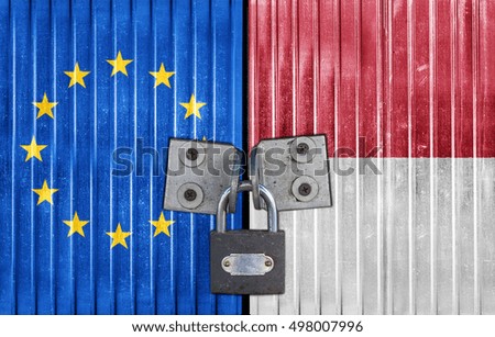 EU and Monaco flag on door with padlock