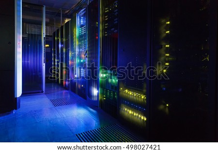 fantastic view of the mainframe in  data center rows Royalty-Free Stock Photo #498027421