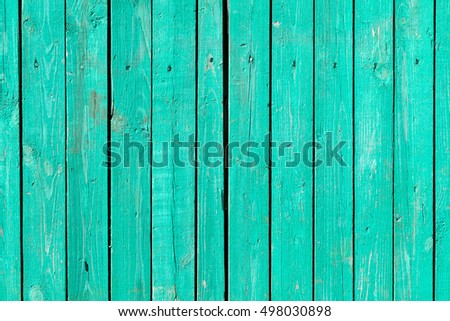 The texture of old wood, green background.