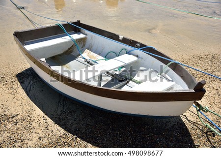 boat by cornwall in st.yves lying on the beach side on tide