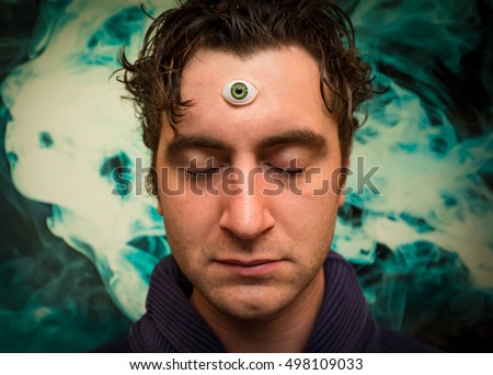 Handsome male fortune teller with magic third eye