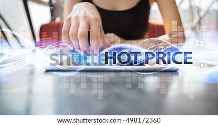 Woman is using tablet pc, pressing on virtual screen and selecting "Hot price".