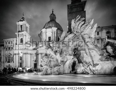 Fountain of the four Rivers (Fontana dei Quattro Fiumi), Piazza Navona in the evening, Rome, Italy, Europe, Vintage black and white