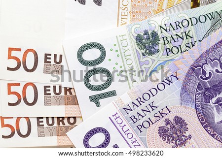   photographed close-up paper money of Poland - zloty and euro