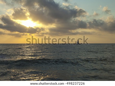 Sea and sky and the sunset with a boat