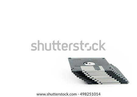 Pile of floppy disk isolated right frame for space on white background