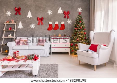 Spacious and light living room decorated for Christmas Royalty-Free Stock Photo #498298198