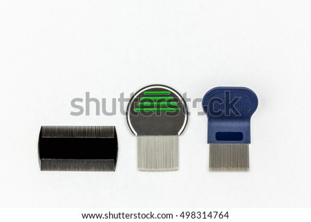 Three different kinds of lice combs. Studio shot on white background with copy space. 