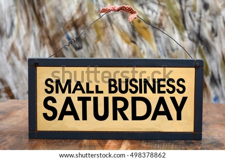 Small Business Saturday Sign on Wood Frame Royalty-Free Stock Photo #498378862