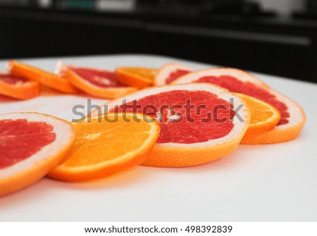 Pictured on citrus fruit, orange, grapefruit