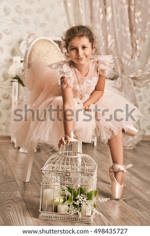 ballerina girl in the pale peach dress