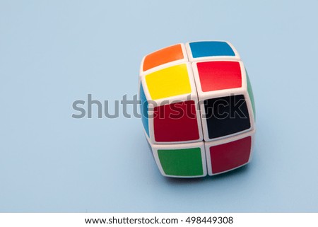 cube puzzle on blue background