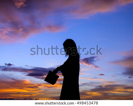 beautiful view , a girl and beautiful twilight with sunset , Siluate , Thailand , Asia