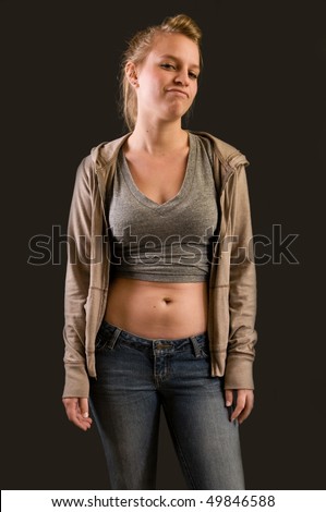 hip teen girl with attitude and navel piercing