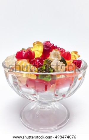 picture of gummy bears in glass ice cream cup isolated on white background