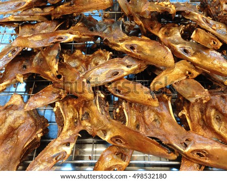fried platypus on the Steel tray.( fried duck mouth)