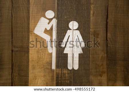 Funny wc restroom symbols man trying to look at woman in toilet