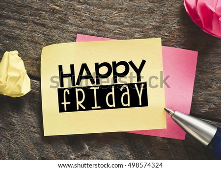 Happy friday / Note with happy friday on the wooden background