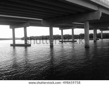 This is a photo I took of the view from under the Sunshine Highway Bridge of the Maroochy River as the sun is setting. I have manipulated the photo by adjusting the saturation. 