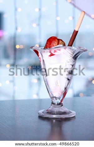  Ice-cream with fresh berries of a strawberry