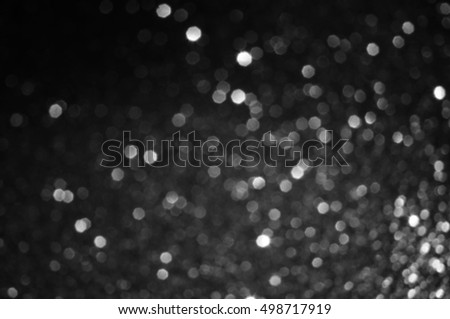 abstract bokeh light shines background in black and white