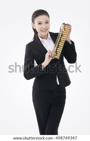 Asian business woman with abacus