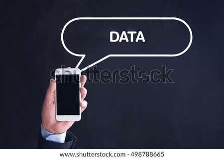 Hand Holding Smartphone with DATA written speech bubble