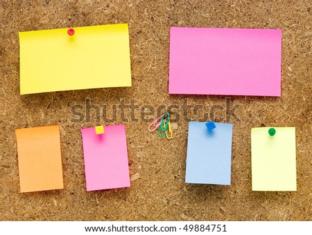 empty notes on old wooden background