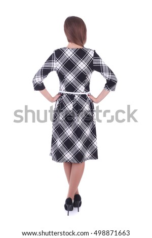 pretty young girl wearing checkered dress with the white belt