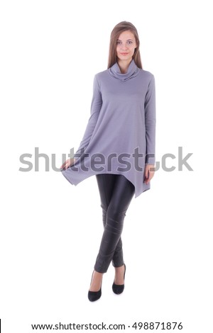 pretty young girl wearing grey knitted tunic Royalty-Free Stock Photo #498871876