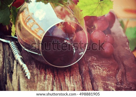 Wine on the wooden background