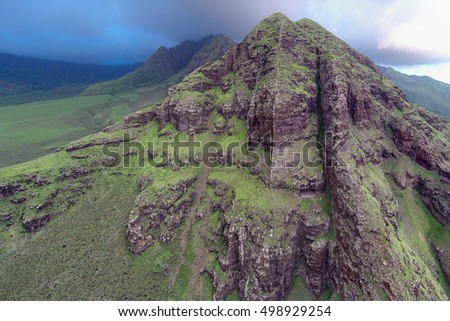 Aerial view of Upper Makua cave in Makaha, Hawaii and Makua Valley in the background