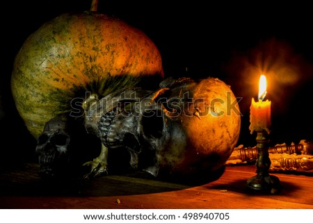 Still Life with skull, candle and Pumpkin