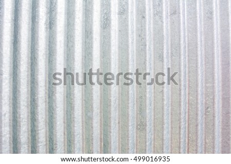 old weathered corrugated zinc texture background with rust