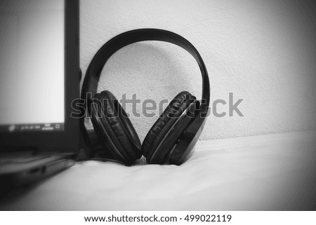 earphone on bed in at home
