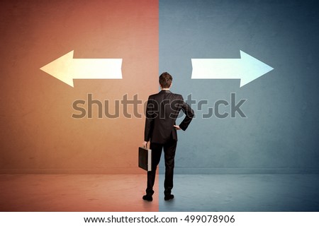 Salesman in doubt standing in front of two arrows on blue and red background concept