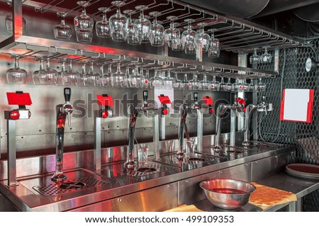 glasses and beer taps in the pub