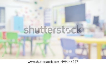 Kindergarten classroom school background. Class room for children students or
nursery kids. Blur daycare preschool.

