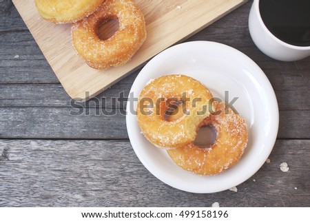 Donut with coffee cup