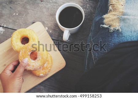 Selfie of donut with coffee cup