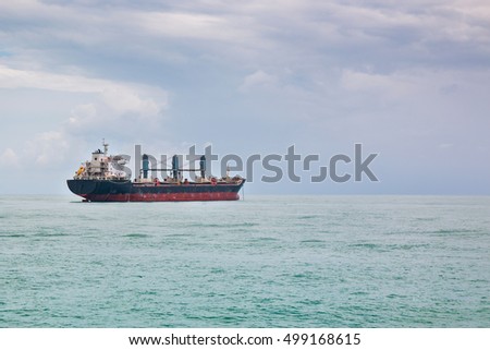 Cargo ship sailing in still water, China