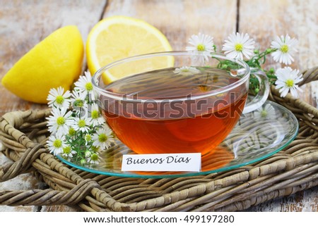 Buenos Dias (good morning in Spanish) card with cup of chamomile tea on wicker tray
