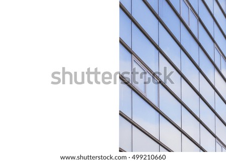 Blank billboard on modern office building made from glass and steel. Mock up