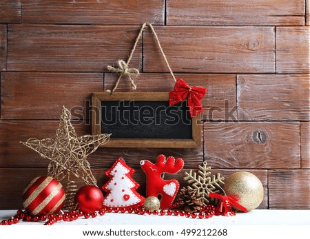Frame on the brown wooden background