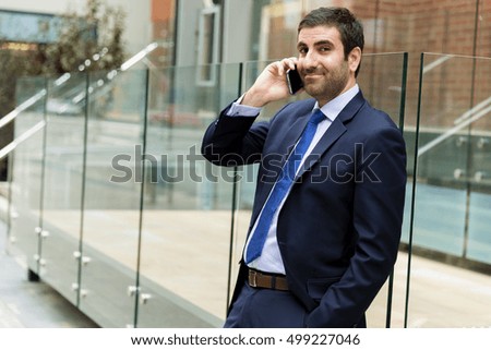Portrait of handsome businessman outdoor